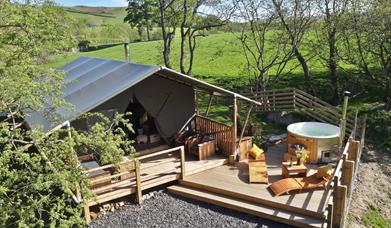 Relax and unwind in your private outdoor sundeck and hot tub