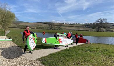 Paddleboarding at Meadow Springs Trefeglwys