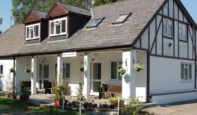 Front view of the guest house showing where you can sit and enjoy the sun.