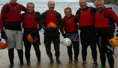 A typical adult group after a Coasteering session at our stunning venue on Anglesey.