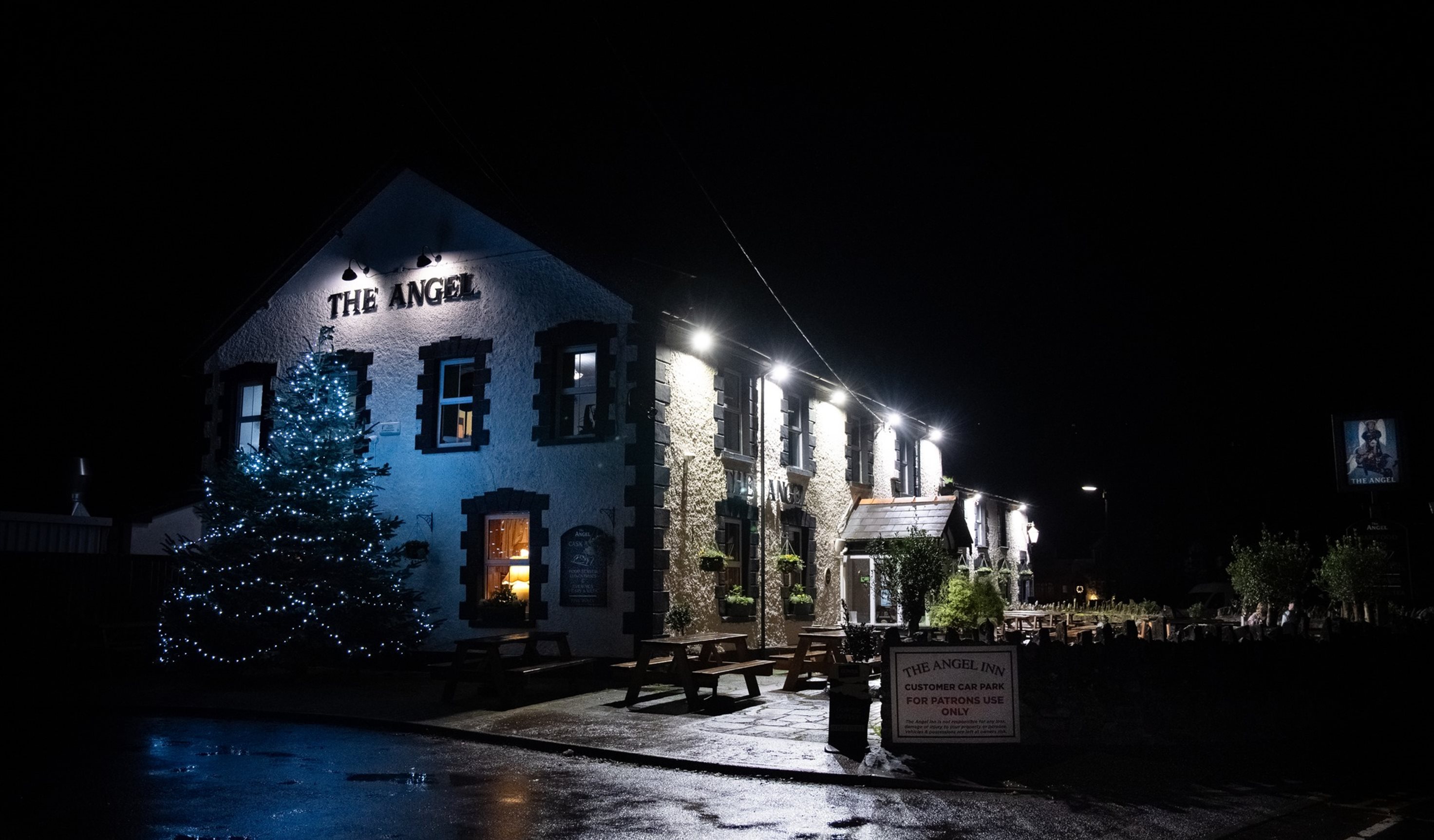 Exterior View of The Angel Inn at night.