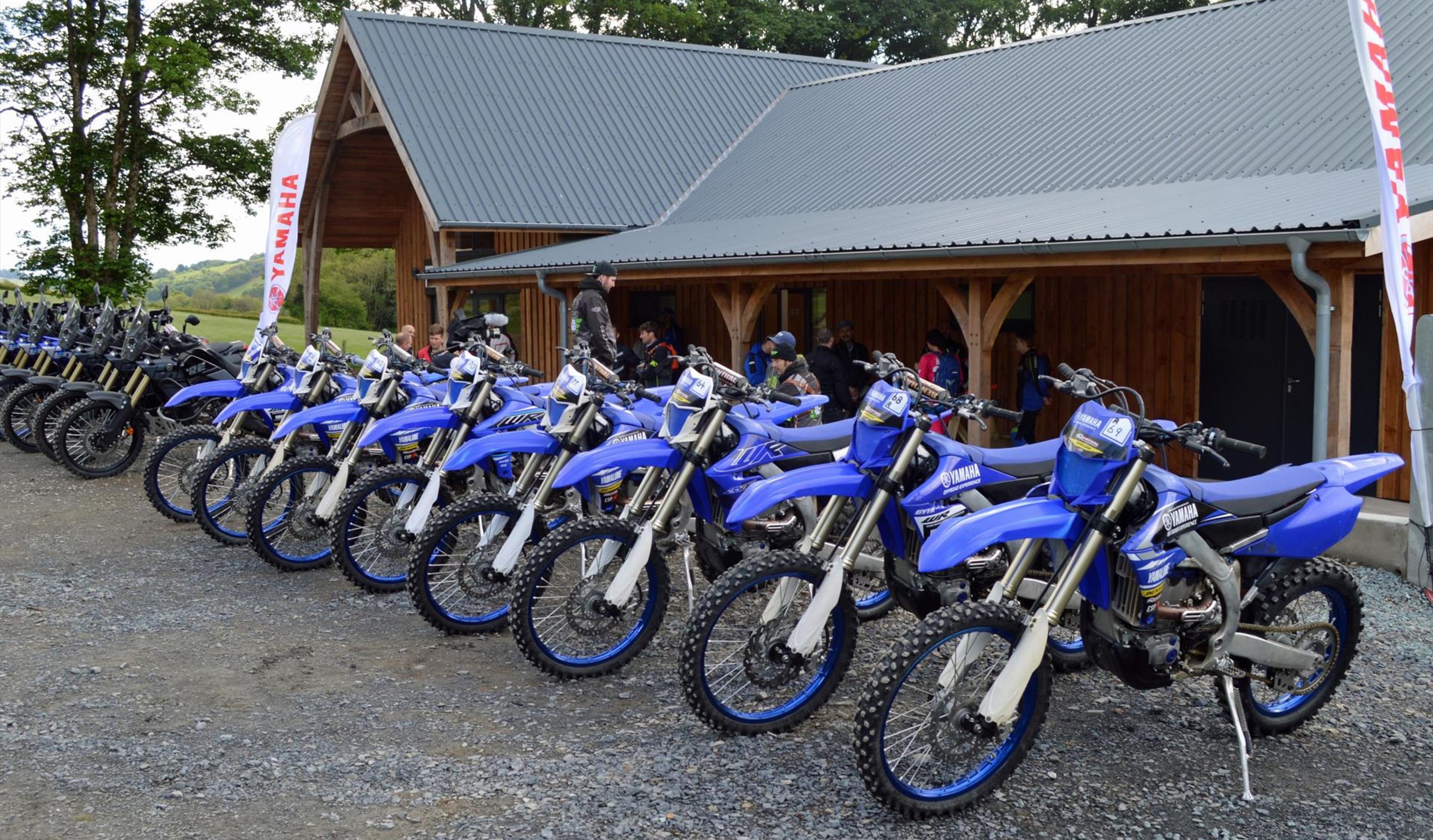 Yamaha Enduro and Adventure bikes lined up in front of the all new Yamaha Adventure Centre in Mid Wales