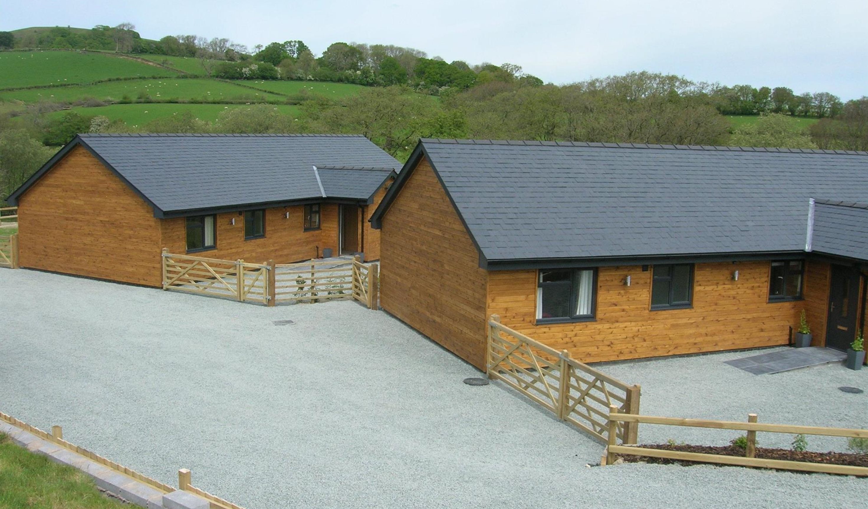 Entrance to both Lodges which are brand new for 2019 and graded 5 star by Visit Wales.  These luxury lodges will sleep up to 6 guests each in 3 bedroo