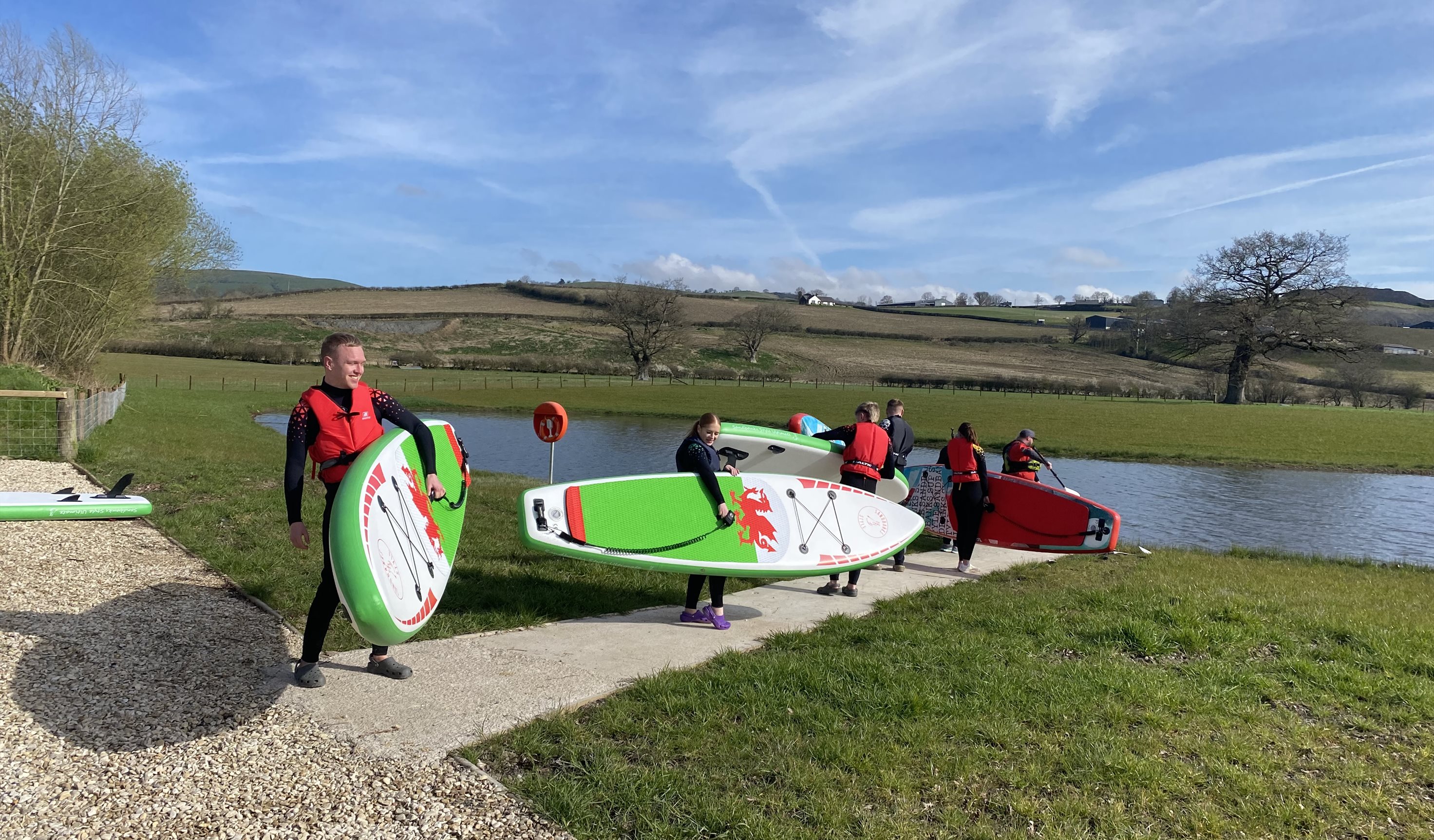 Paddleboarding at Meadow Springs Trefeglwys