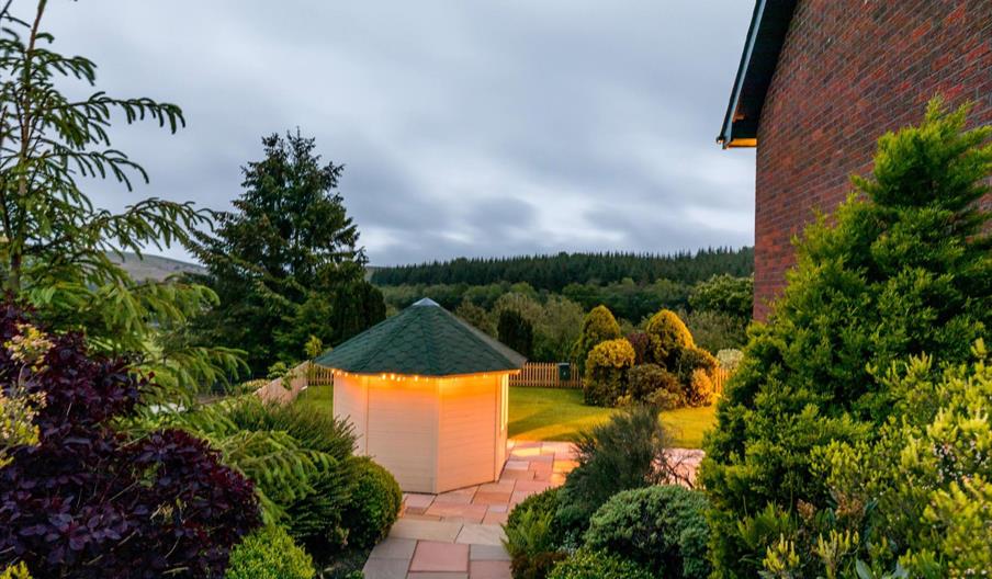 This is the typical view from the patio area across the woodland beyond.