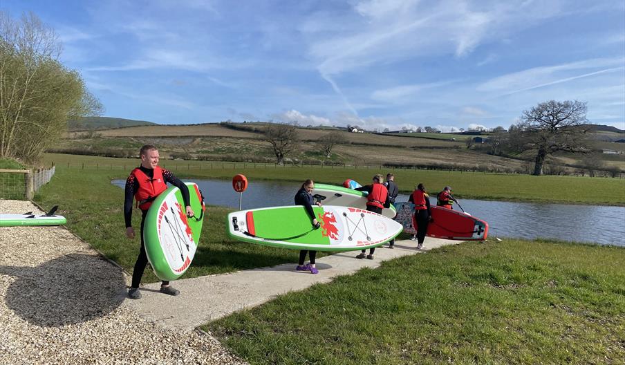 Paddleboarding at Meadow Springs Trefeglwys