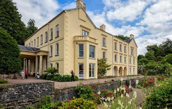 Aberglasney mansion with visitors outside