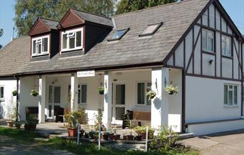 Front view of the guest house showing where you can sit and enjoy the sun.