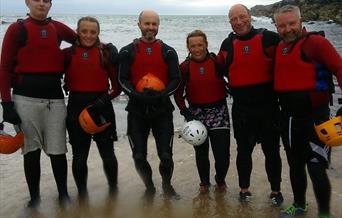 A typical adult group after a Coasteering session at our stunning venue on Anglesey.