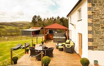 Outdoor seating and decking area at Cwmcelyn self catering Llandrindod Wells