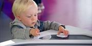 Young Person, Using Air Table