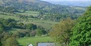 Panoramic views from Ty Gwyn Farm, great walking, wildlife, dog walking. Roofs of farmstead and courtyard with Granary cottage seen in photo.