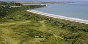 Final holes, with Cardigan Bay beyond the dunes