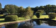 This is a small ornamental pool and the perfect place to sit back and relax at Derwen Mill Holiday Park, in Guilsfield, near Welshpool.