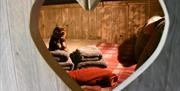 A double bed in a cosy cabin