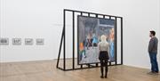 Image of visitors in the gallery looking at Hannah Quinlan and Rosie Hastings' Exhibition in My Room.