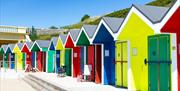 The iconic beach huts at Barry Island.  Available to hire.