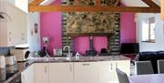The contemporary kitchen and living area in Swn y Nant