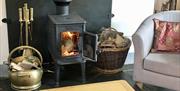 Log burner with chair