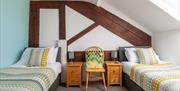 Twin bedroom in Pine Cottage
