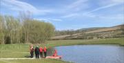 Paddleboarding at Meadow Springs Trefeglwys