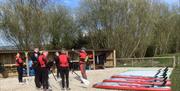 Paddleboarding at Meadow Springs Trefeglwys