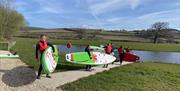 Paddleboarding at Meadow Springs Trefeglwys