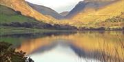 A close up of the view up Talyllyn Lake from the Beer Garden at the Pen-y-Bont Hotel.