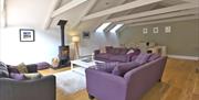 Ty Isaf lounge with woodburning stove