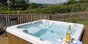 Private and secluded hot tub overlooking fields