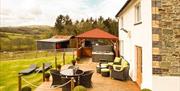 Outdoor seating and decking area at Cwmcelyn self catering Llandrindod Wells