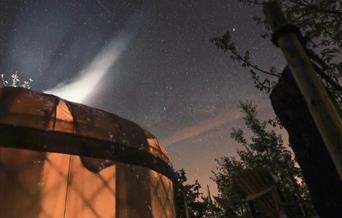 The Secret Yurts
Exterior of yurt under a starlit sky